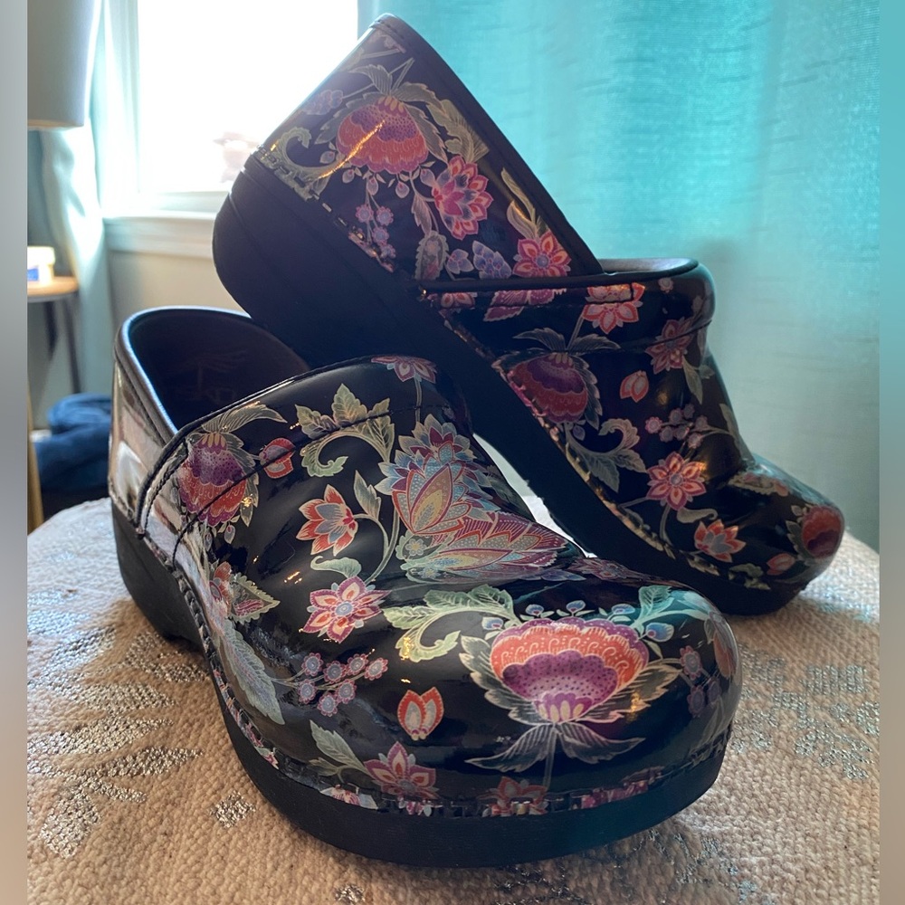 Dansko Black Floral Women's Clogs